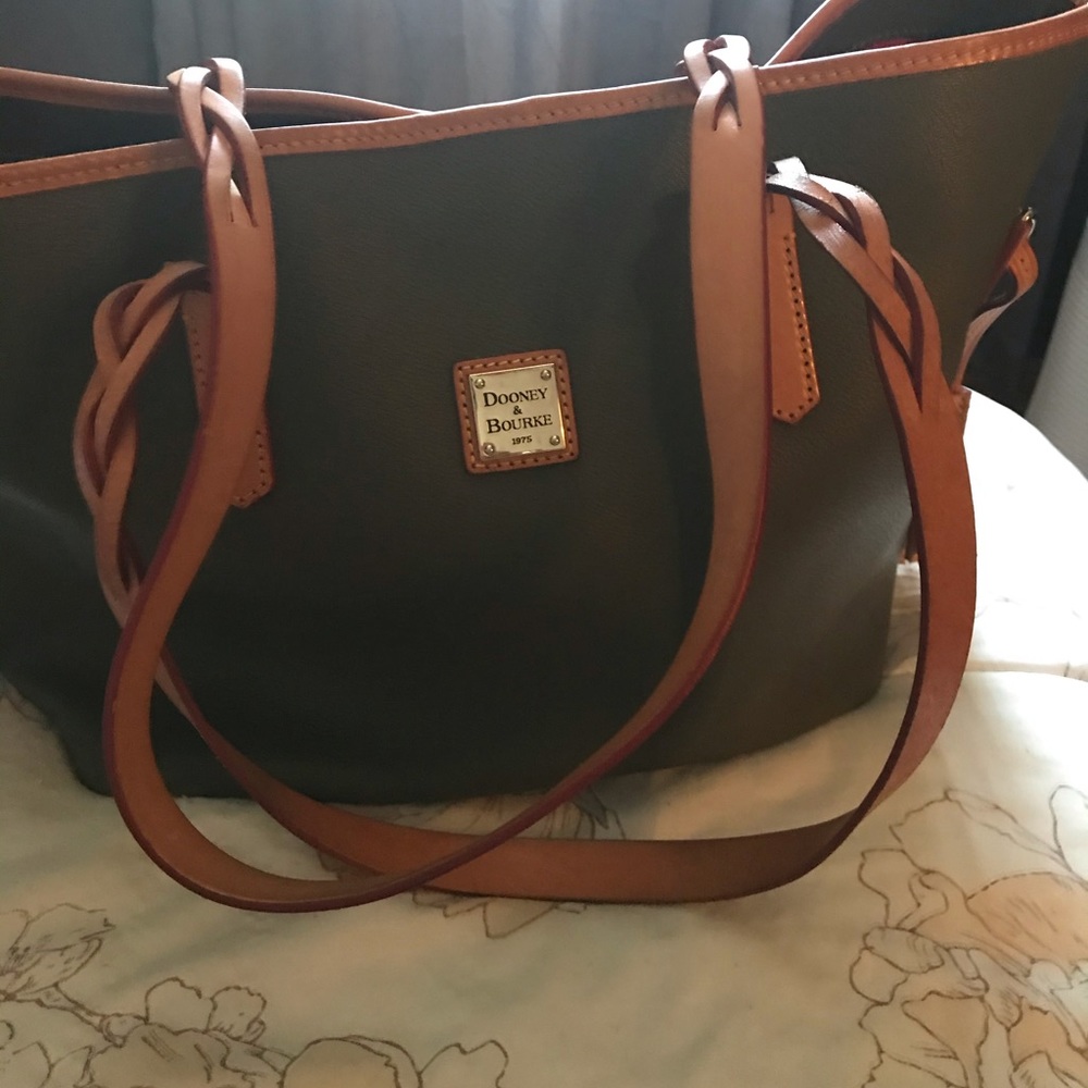 Dooney Burke bag size of the never full from another designer